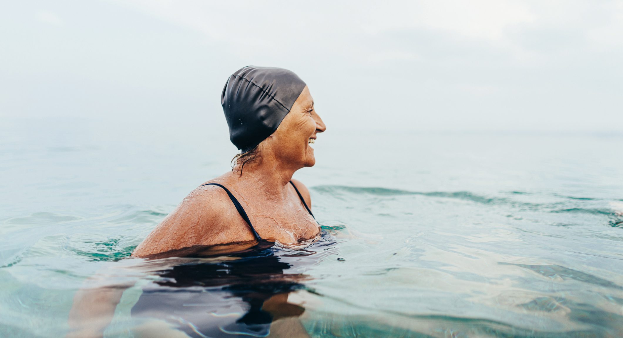 Senior female swimmer in the sea