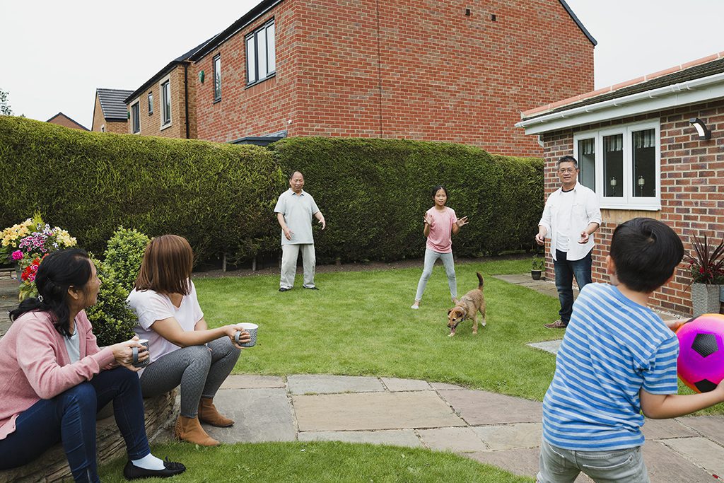 Family in the Garden in Summer