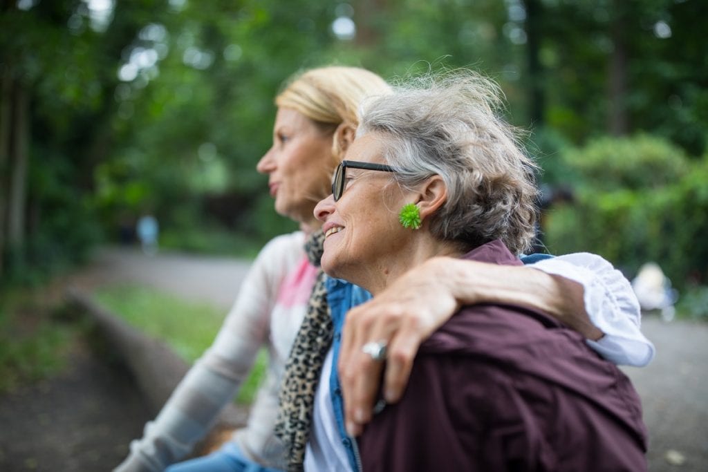 Women sitting together outside