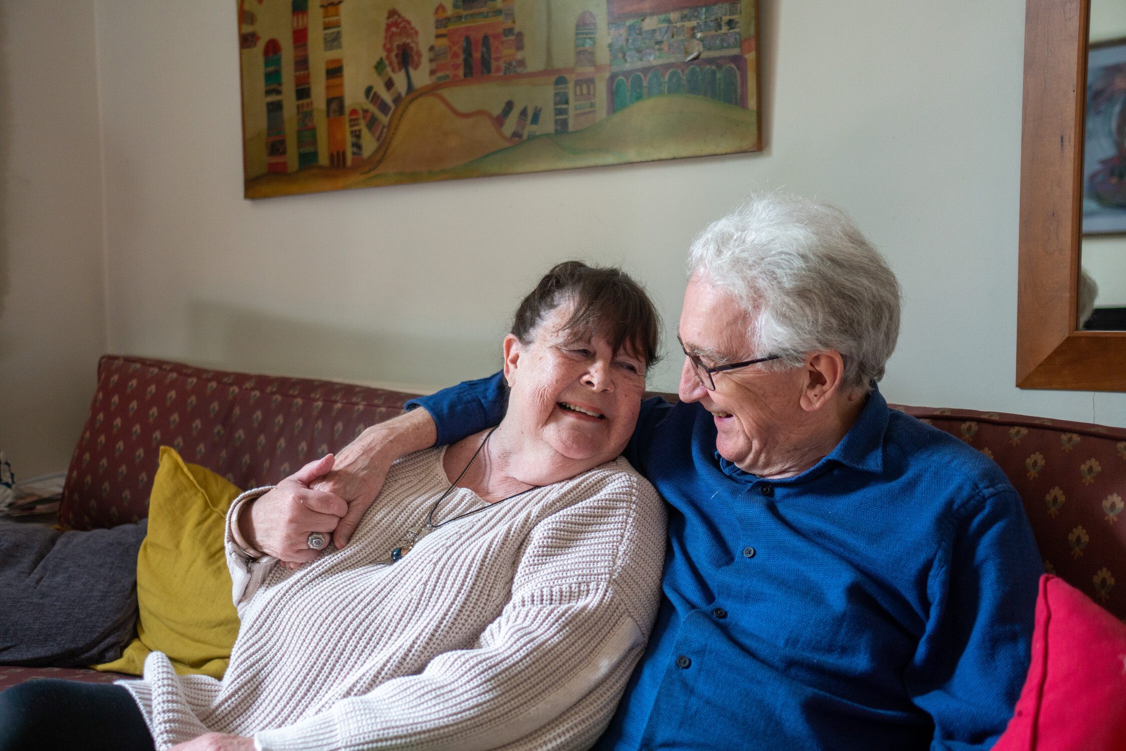 man and woman on couch